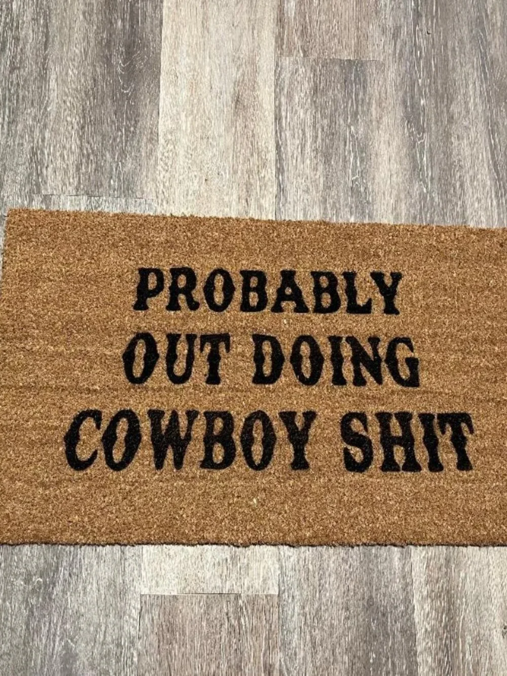 PROBABLY OUT DOING COWBOY SHIT decorative coir doormat